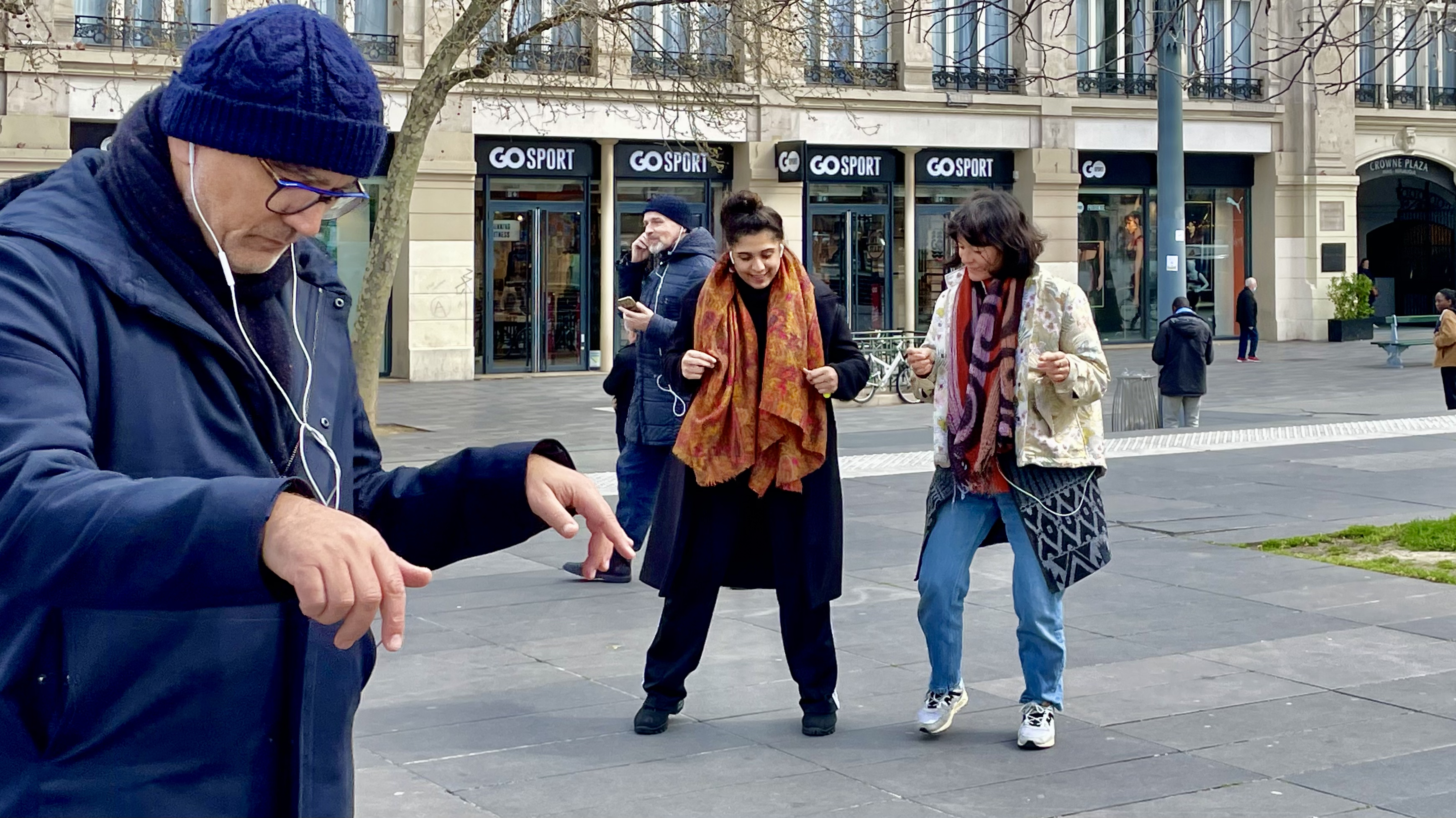Workshop participants gathered in a public square